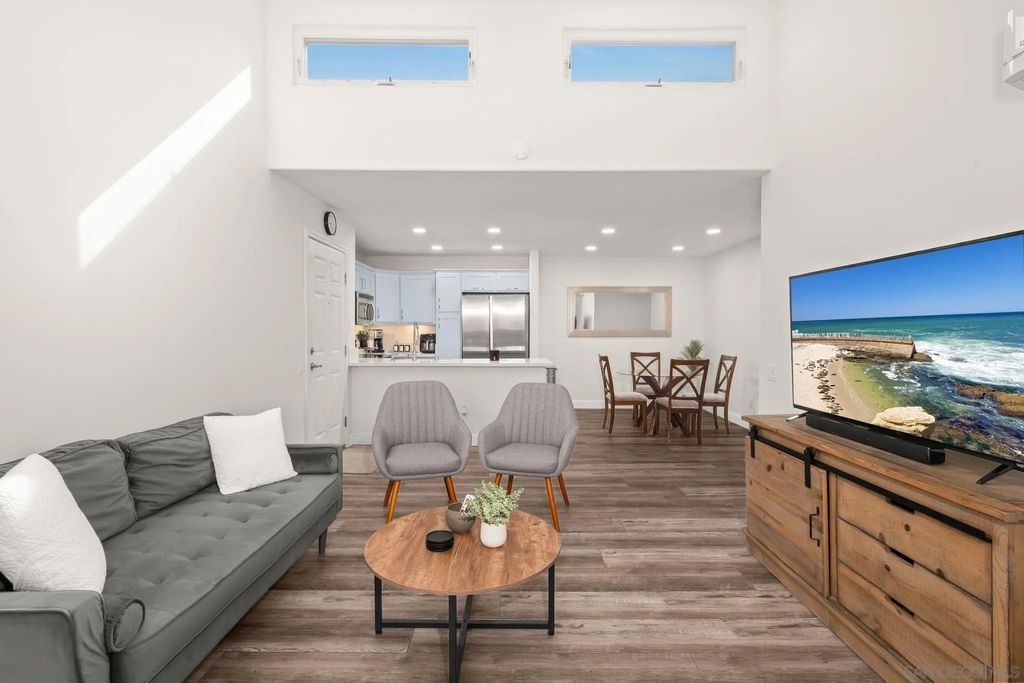 Photo of 5252 Balboa Arms Dr #231, San Diego, CA 92117 (MLS # 260009483)