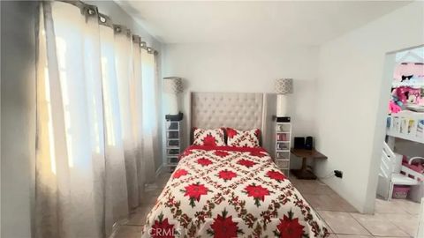 Tiny photo for 1715 E 70th St, Los Angeles, CA 90001 (MLS # CV25239536)