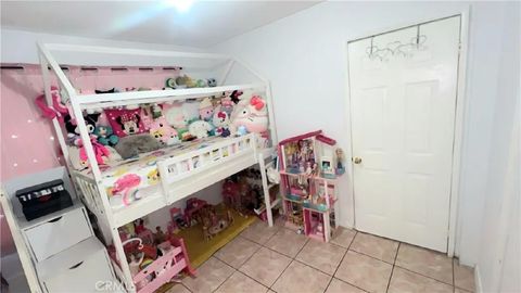 Tiny photo for 1715 E 70th St, Los Angeles, CA 90001 (MLS # CV25239536)