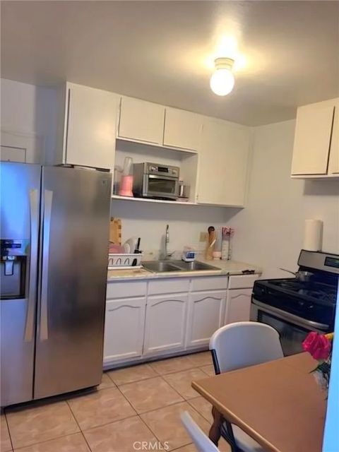 Tiny photo for 1715 E 70th St, Los Angeles, CA 90001 (MLS # CV25239536)