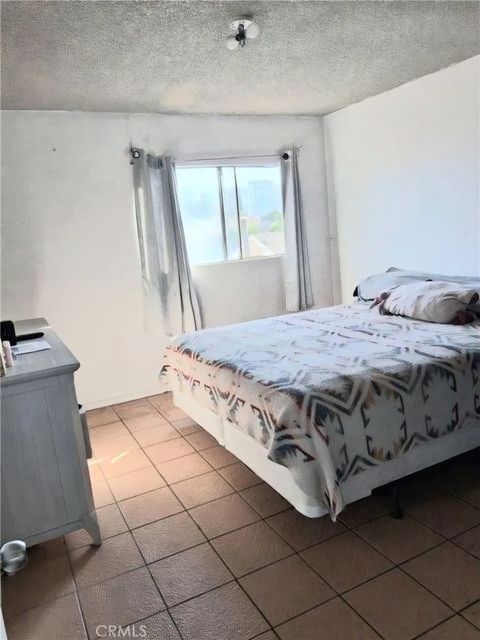 Tiny photo for 1715 E 70th St, Los Angeles, CA 90001 (MLS # CV25239536)