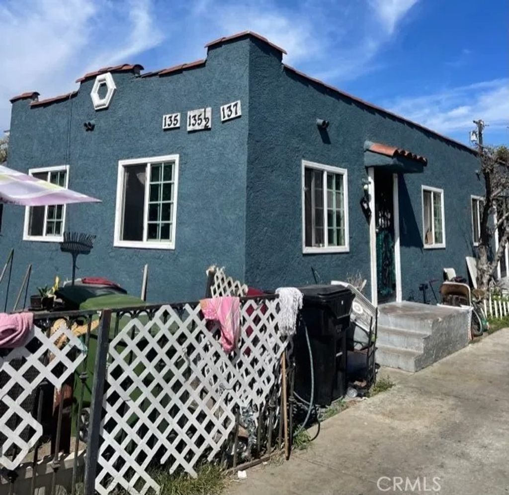Photo of 135 E 77th St, Los Angeles, CA 90003 (MLS # DW26055329)