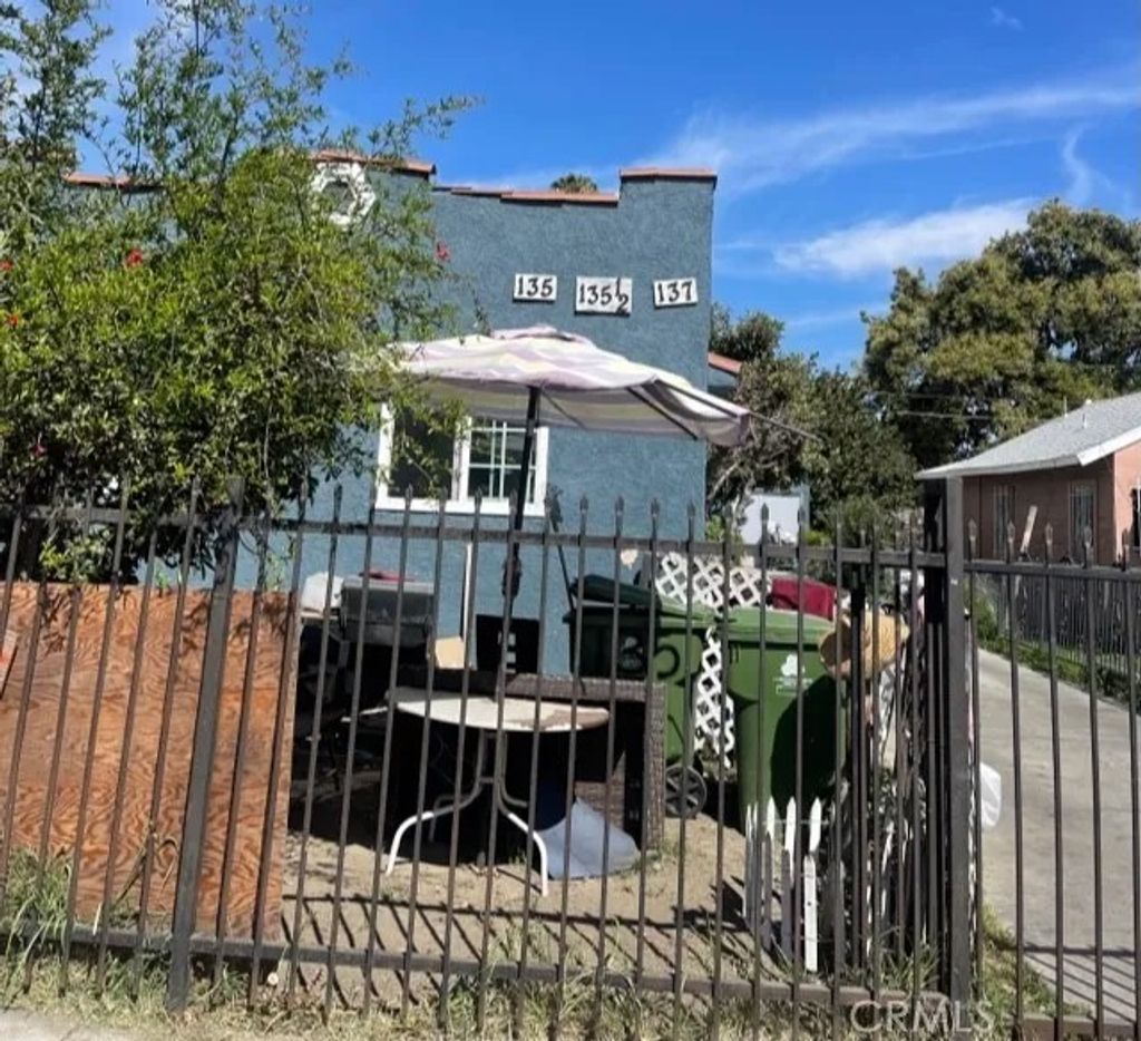 Photo of 135 E 77th St, Los Angeles, CA 90003 (MLS # DW26055329)