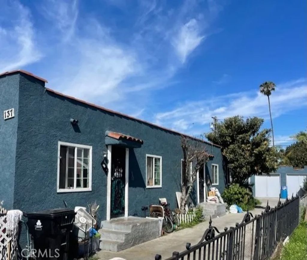 Photo of 135 E 77th St, Los Angeles, CA 90003 (MLS # DW26055329)