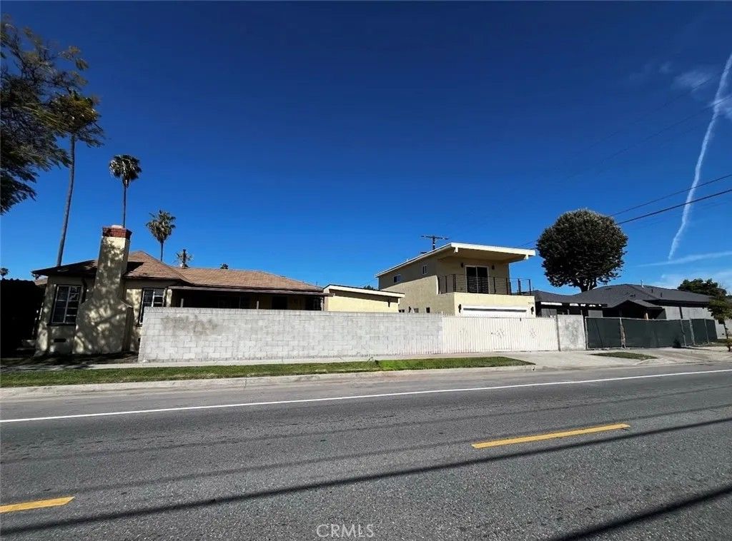 Photo of 3892 Cherrywood Avenue, Los Angeles, CA 90008 (MLS # DW26044596)