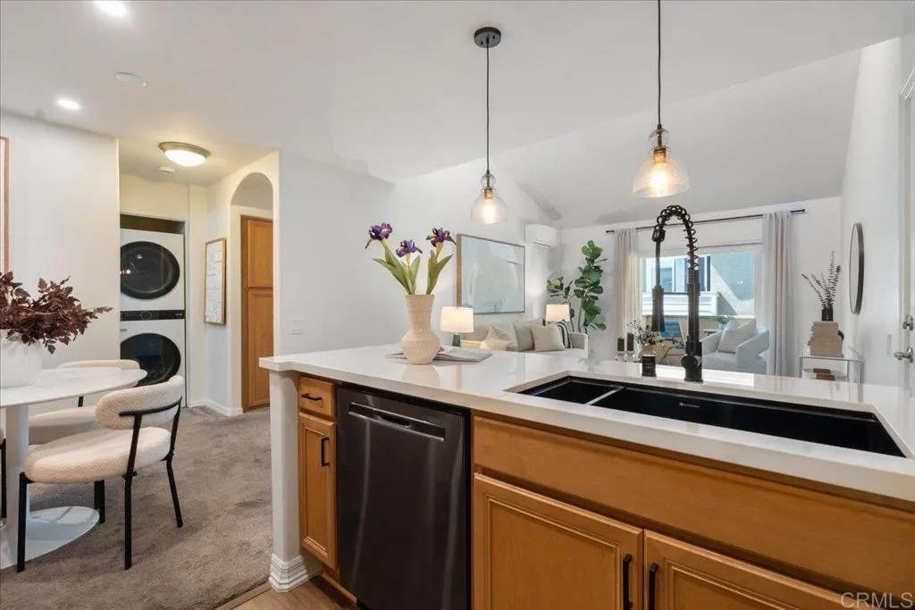 Photo of 5404 Balboa Arms Dr #469, San Diego, CA 92117 (MLS # NDP2605643)