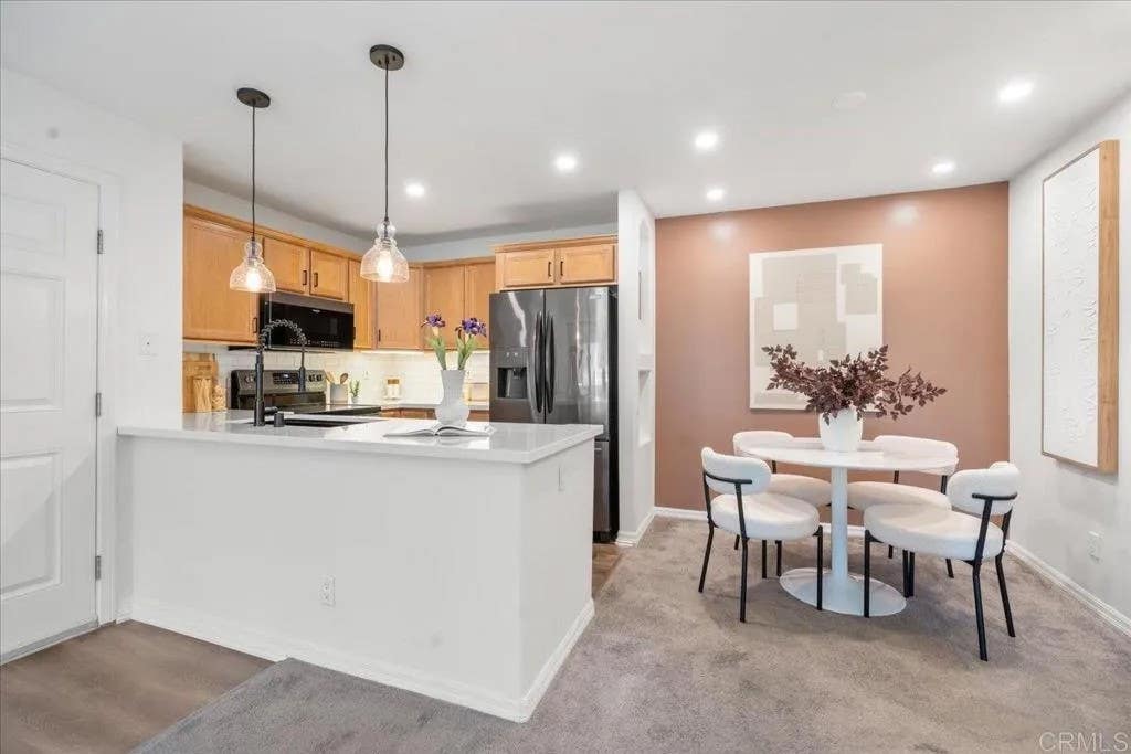 Photo of 5404 Balboa Arms Dr #469, San Diego, CA 92117 (MLS # NDP2605643)