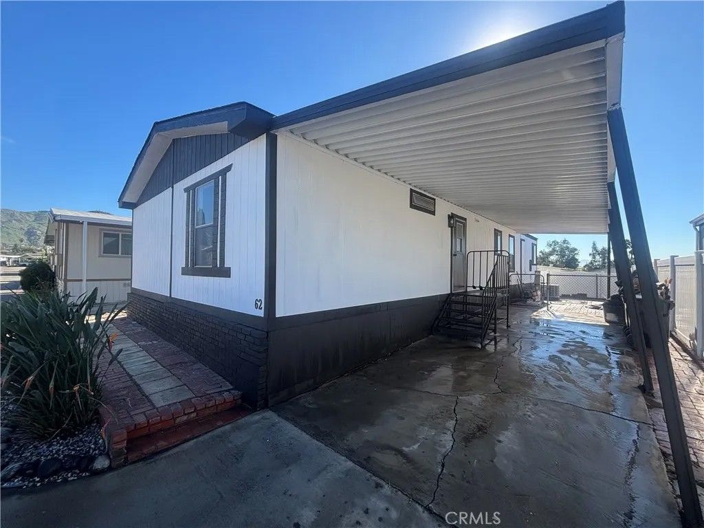 Photo of 22111 Newport Ave #62, Grand Terrace, CA 92313 (MLS # IV26013999)