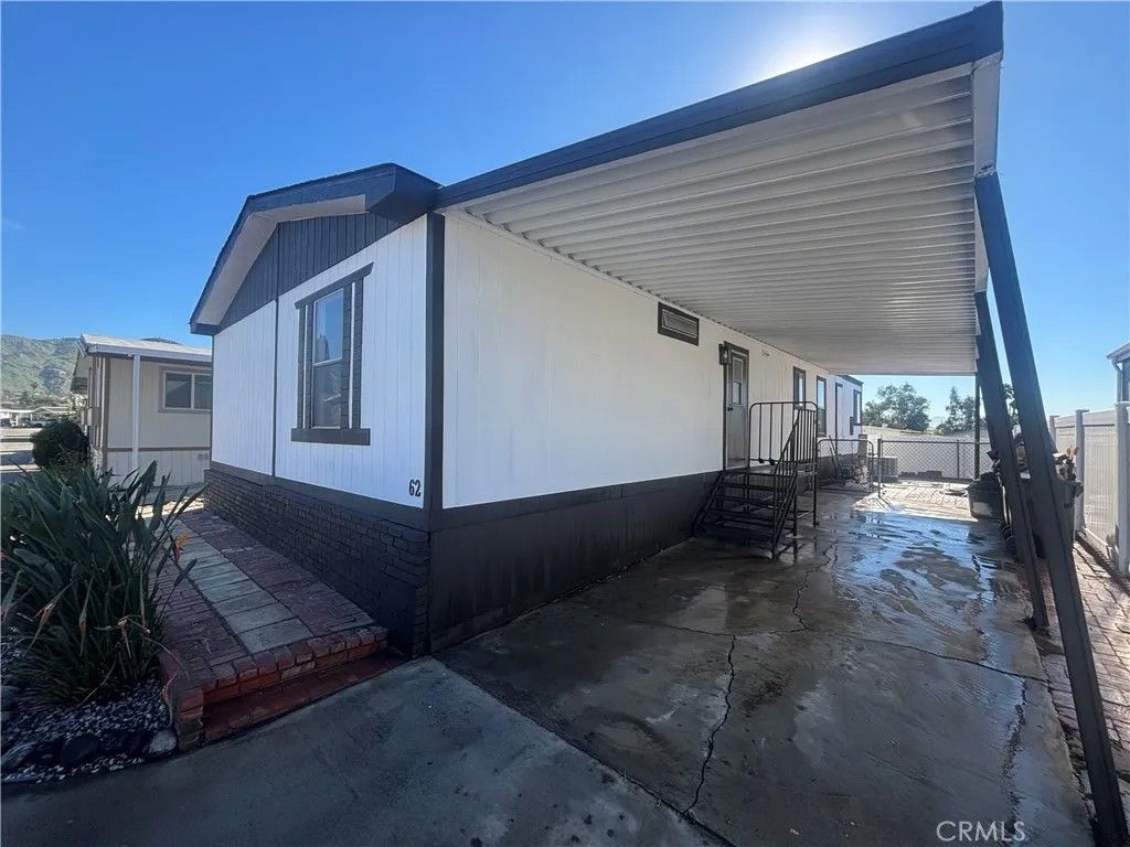 Photo of 22111 Newport Ave #62, Grand Terrace, CA 92313 (MLS # IV26013999)