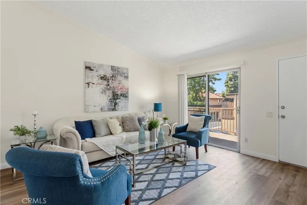 Photo of 1015 Margarita Dr #D202, Corona, CA 92879 (MLS # OC26112514)