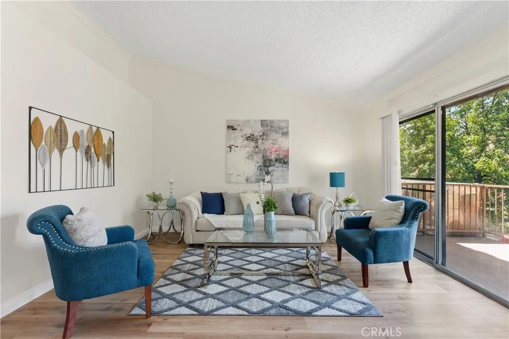 Photo of 1015 Margarita Dr #D202, Corona, CA 92879 (MLS # OC26112514)