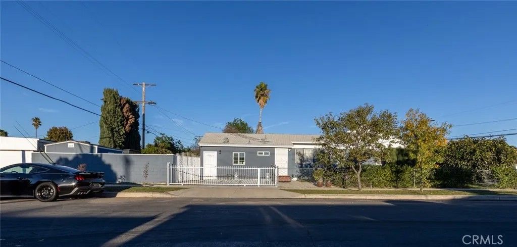 Photo of 13555 Wentworth Street, Arleta, CA 91331 (MLS # CV26013444)