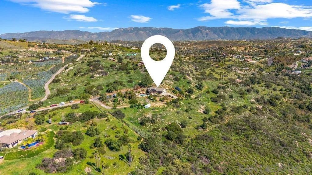 Photo of 11725 Sierra Rojo Rd, Valley Center, CA 92082 (MLS # 260004603)