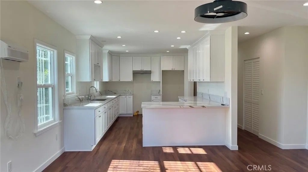 Photo of 1167 Berendo St, Los Angeles, CA 90029 (MLS # TR26006454)