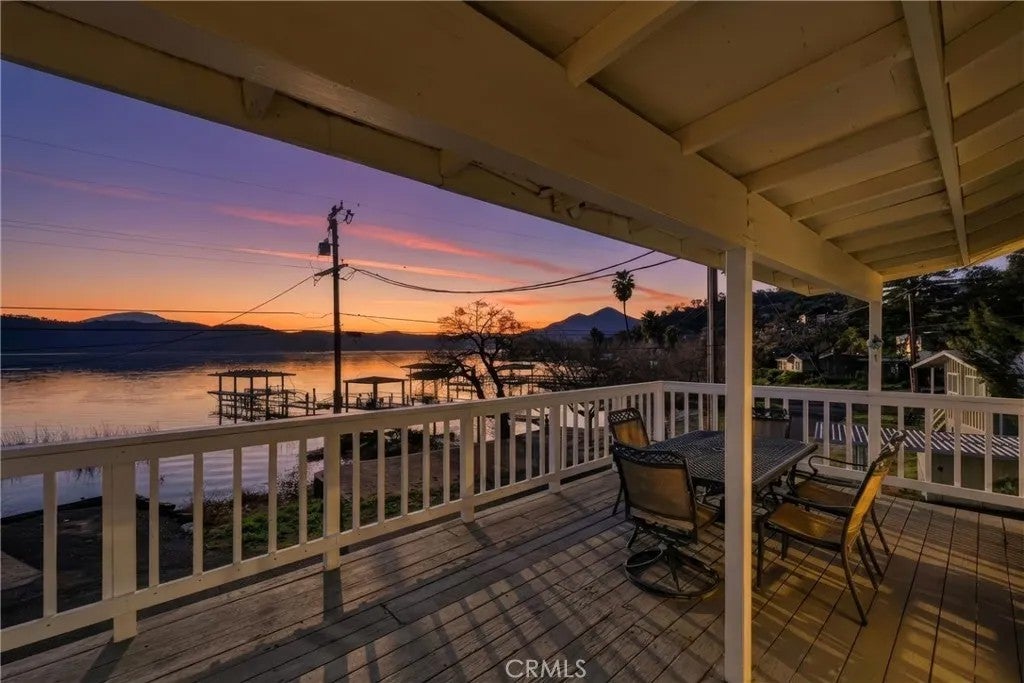 Photo of 13680 Lower Lakeshore Dr, Clearlake, CA 95422 (MLS # LC26033263)
