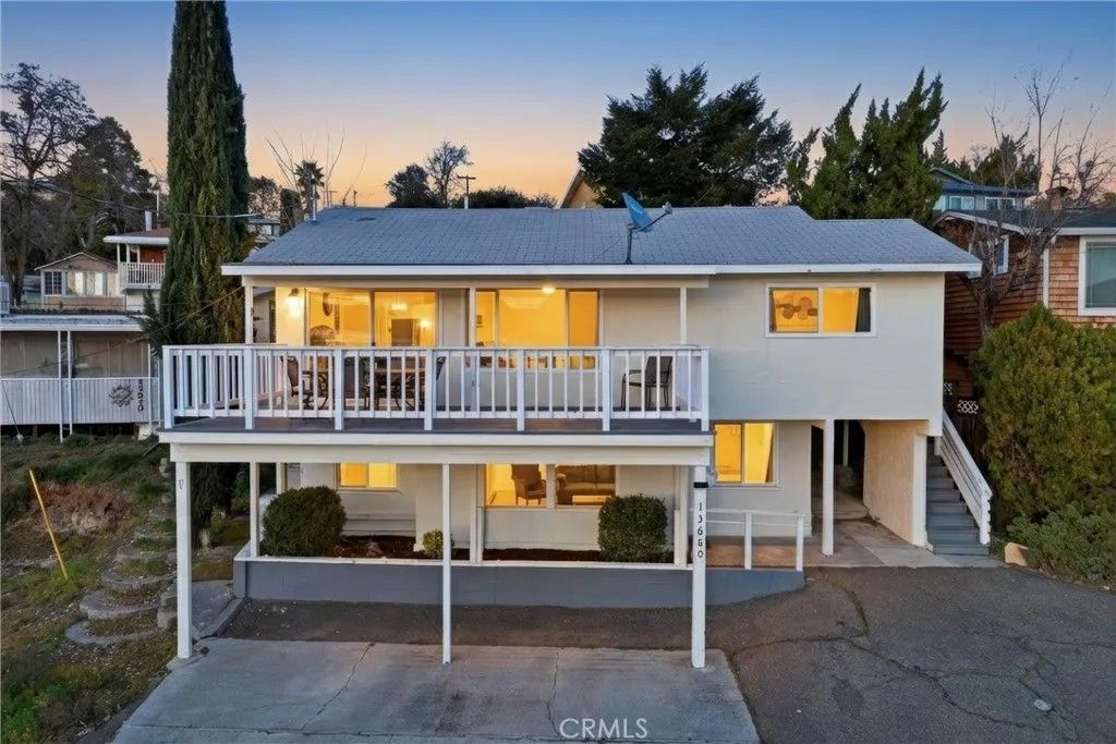 Photo of 13680 Lower Lakeshore Dr, Clearlake, CA 95422 (MLS # LC26033263)