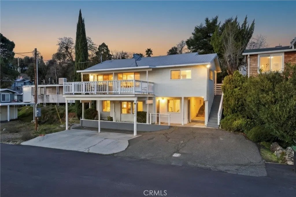 Photo of 13680 Lower Lakeshore Dr, Clearlake, CA 95422 (MLS # LC26033263)