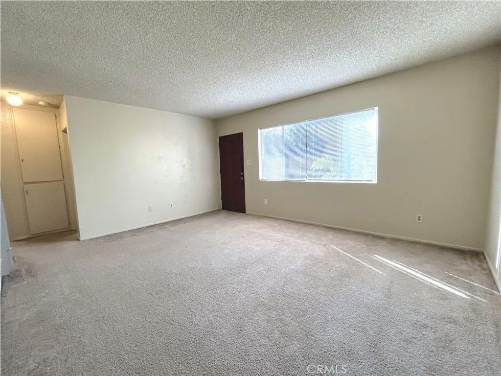 Photo of 5977 Myrtle Avenue, Long Beach, CA 90805 (MLS # PW26015230)