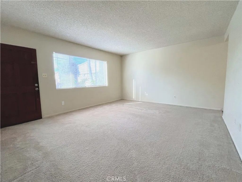 Photo of 5977 Myrtle Avenue, Long Beach, CA 90805 (MLS # PW26015230)