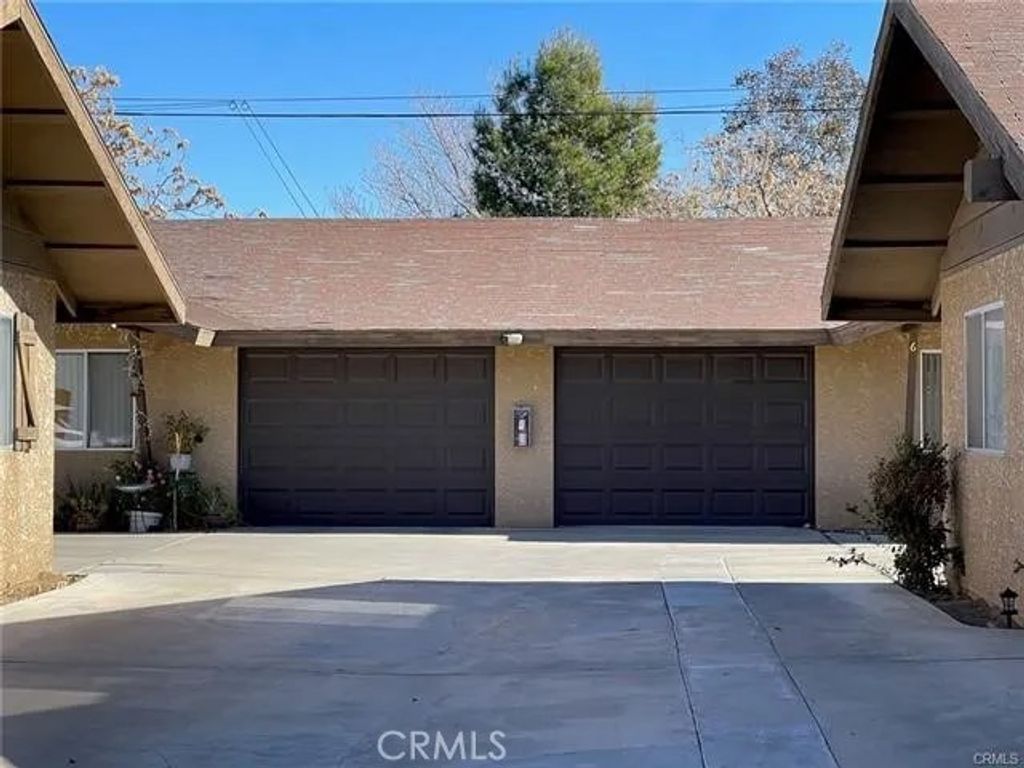 Photo of 7467 Bannock Trl, Yucca Valley, CA 92284 (MLS # IV26044383)