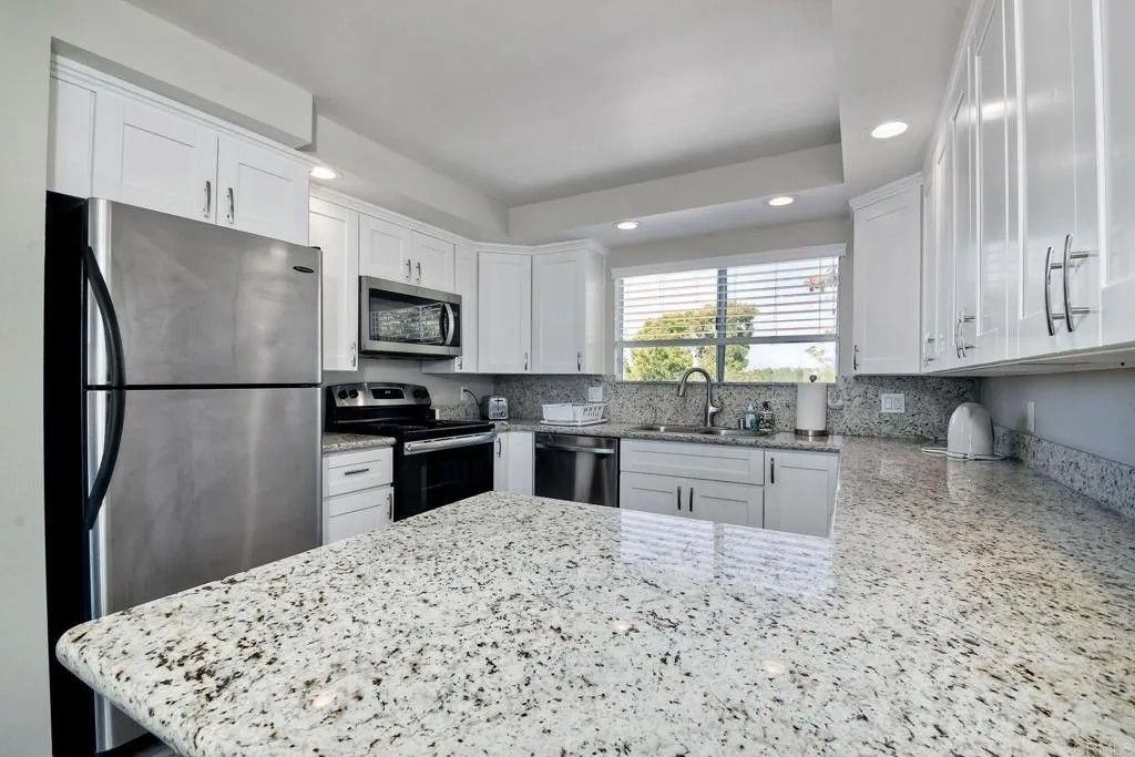 Photo of 6677 Paseo Del Norte #B, Carlsbad, CA 92011 (MLS # 200017671)