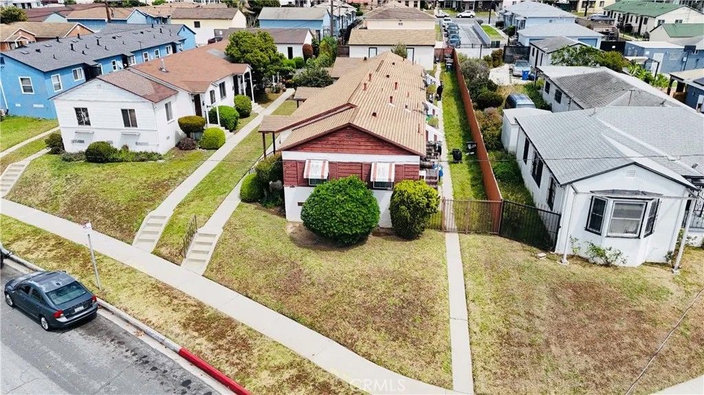 Photo of 10846 S Manhattan Pl, Los Angeles, CA 90047 (MLS # PW26078886)