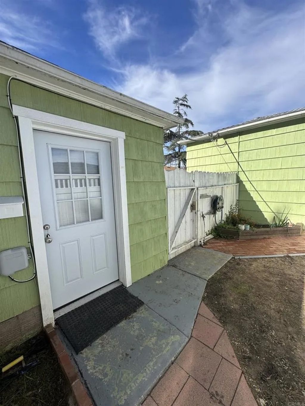 Photo of 7537 Cuyamaca Avenue, Lemon Grove, CA 91945 (MLS # PTP2508834)