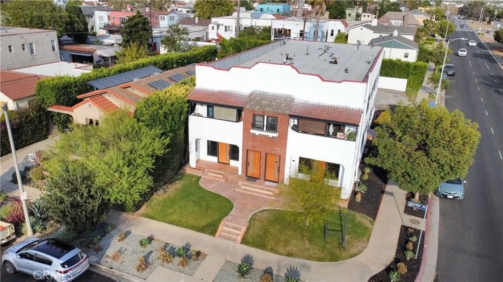 Photo of 1236 S Cloverdale Ave, Los Angeles, CA 90019 (MLS # BB26010971)