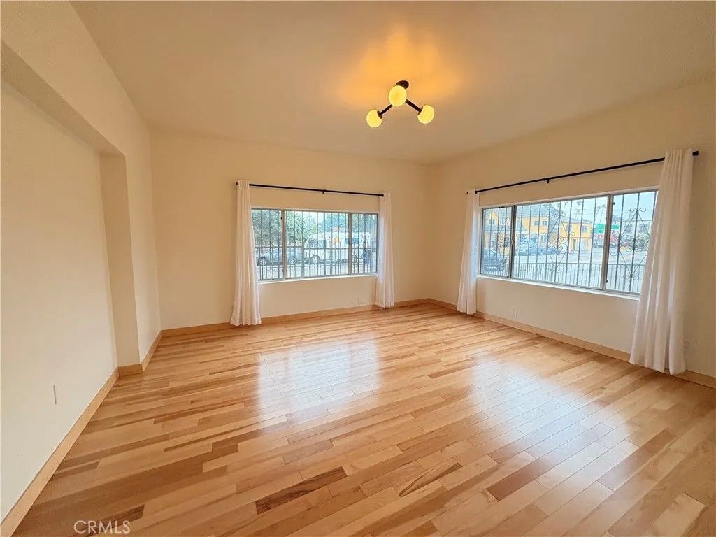 Photo of 1703 W 25th St, Los Angeles, CA 90018 (MLS # DW25280430)
