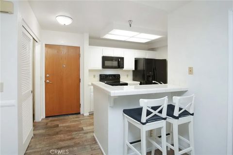 Tiny photo for 11410 Dolan Ave #112, Downey, CA 90241 (MLS # DW25238345)