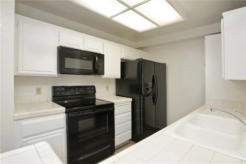 Tiny photo for 11410 Dolan Ave #112, Downey, CA 90241 (MLS # DW25238345)
