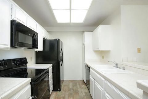 Tiny photo for 11410 Dolan Ave #112, Downey, CA 90241 (MLS # DW25238345)