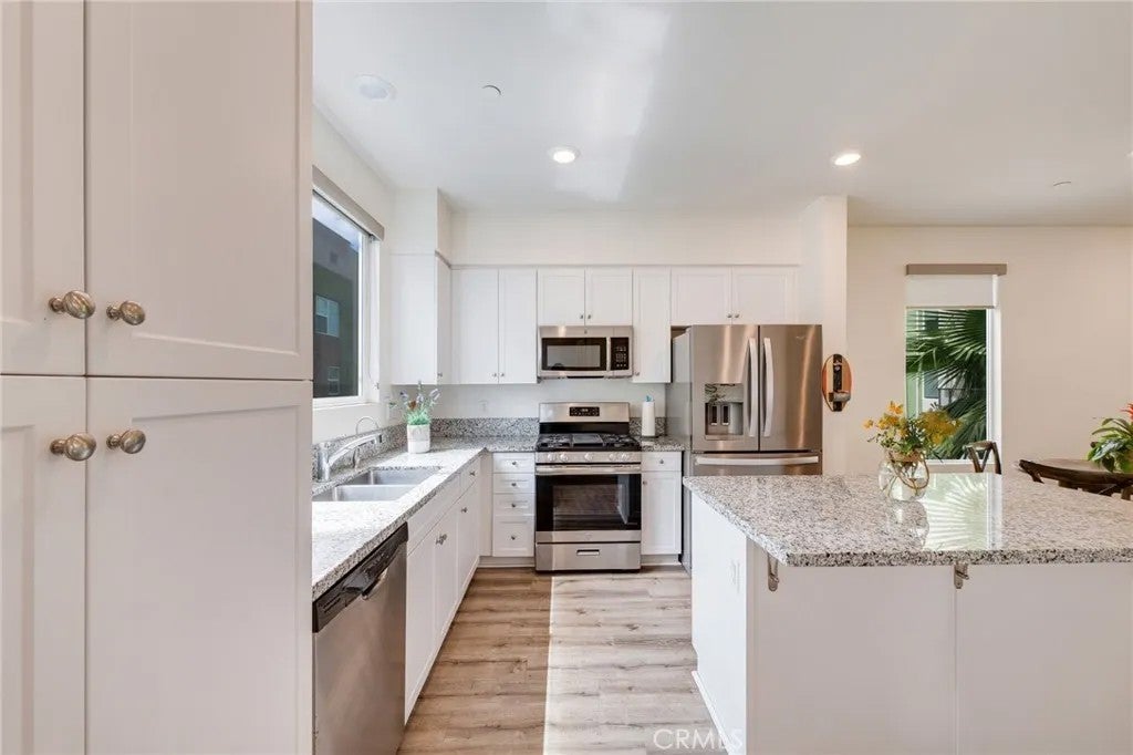 Photo of 17614 Garden House LN, Bellflower, CA 90706 (MLS # RS26198088)