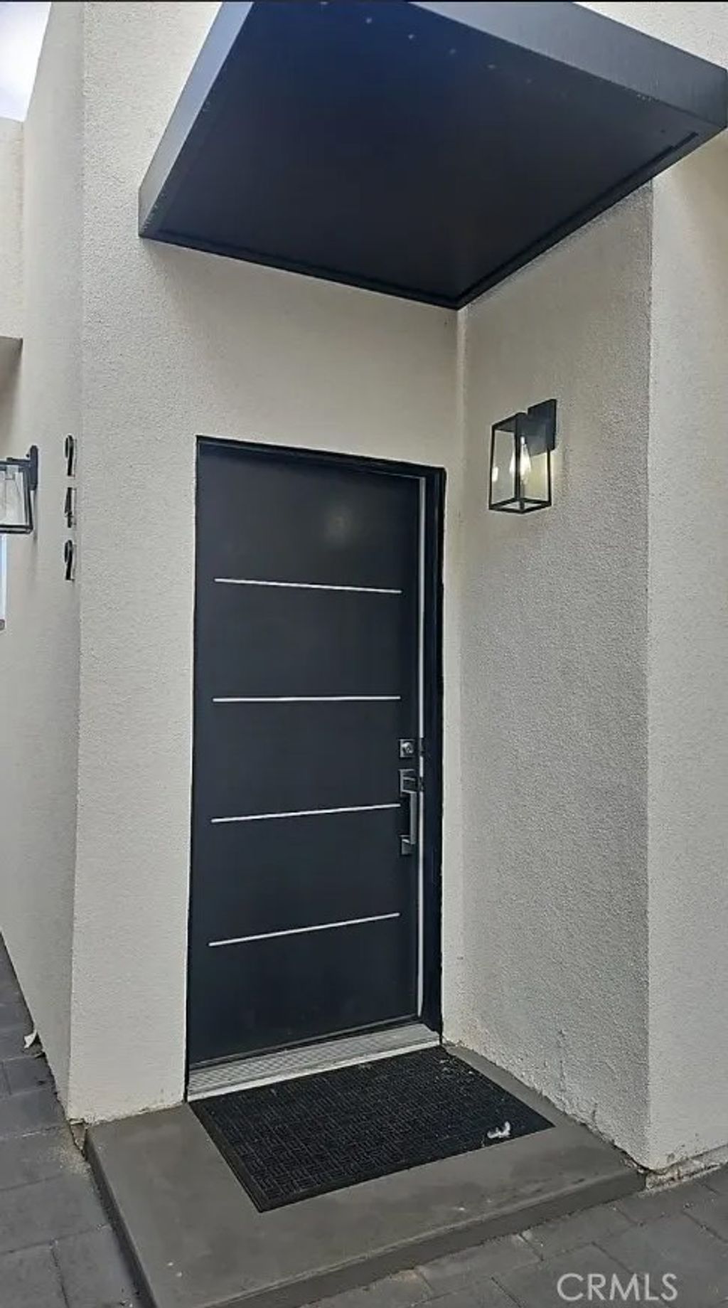 Photo of 949 W Magnolia Street, Compton, CA 90220 (MLS # PW26034206)