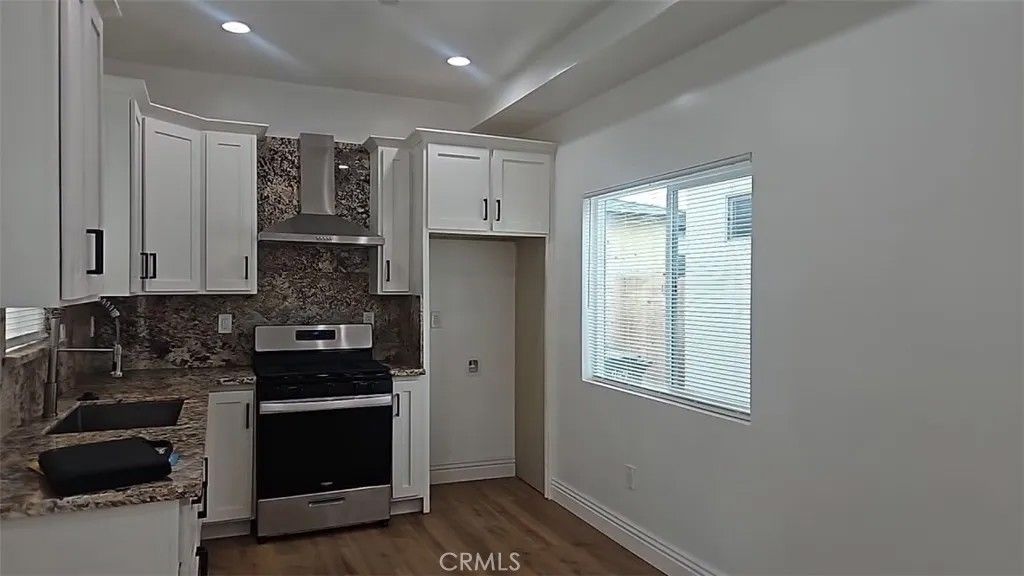 Photo of 949 W Magnolia Street, Compton, CA 90220 (MLS # PW26034206)