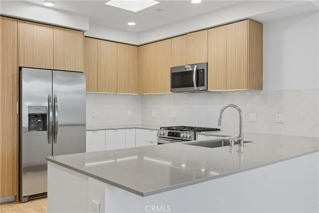 Photo of 12078 Guerin Street #101, Studio City, CA 91604 (MLS # SR25269530)