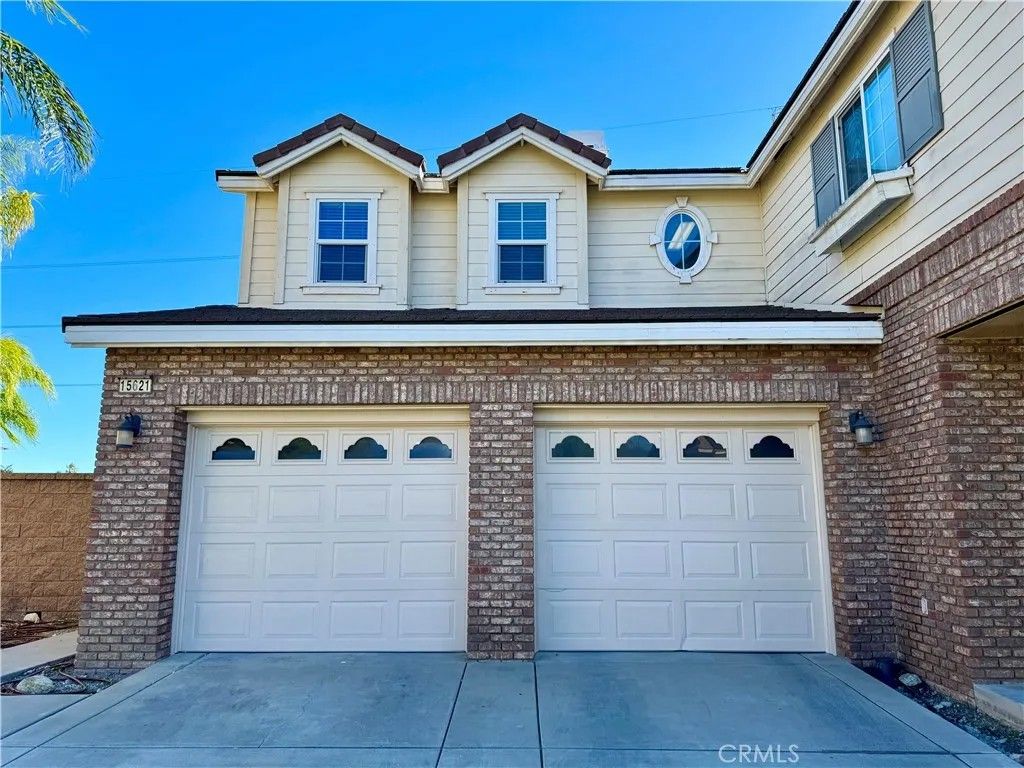Photo of 15621 Pisa Lane, Fontana, CA 92336 (MLS # TR25272201)