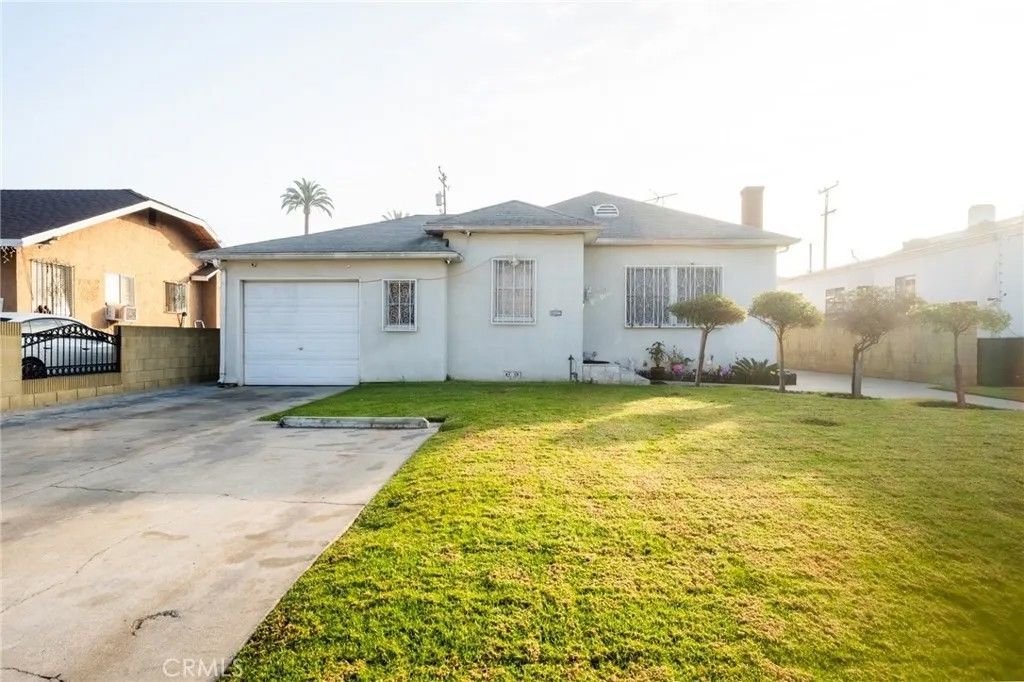Photo of 7136 Stafford Avenue, Huntington Park, CA 90255 (MLS # DW26014492)