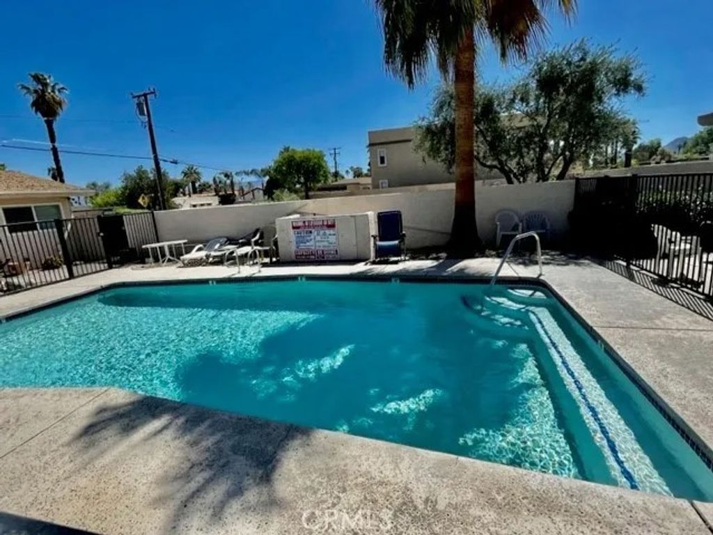 Photo of 73740 Santa Rosa Way #C, Palm Desert, CA 92260 (MLS # NP25266462)