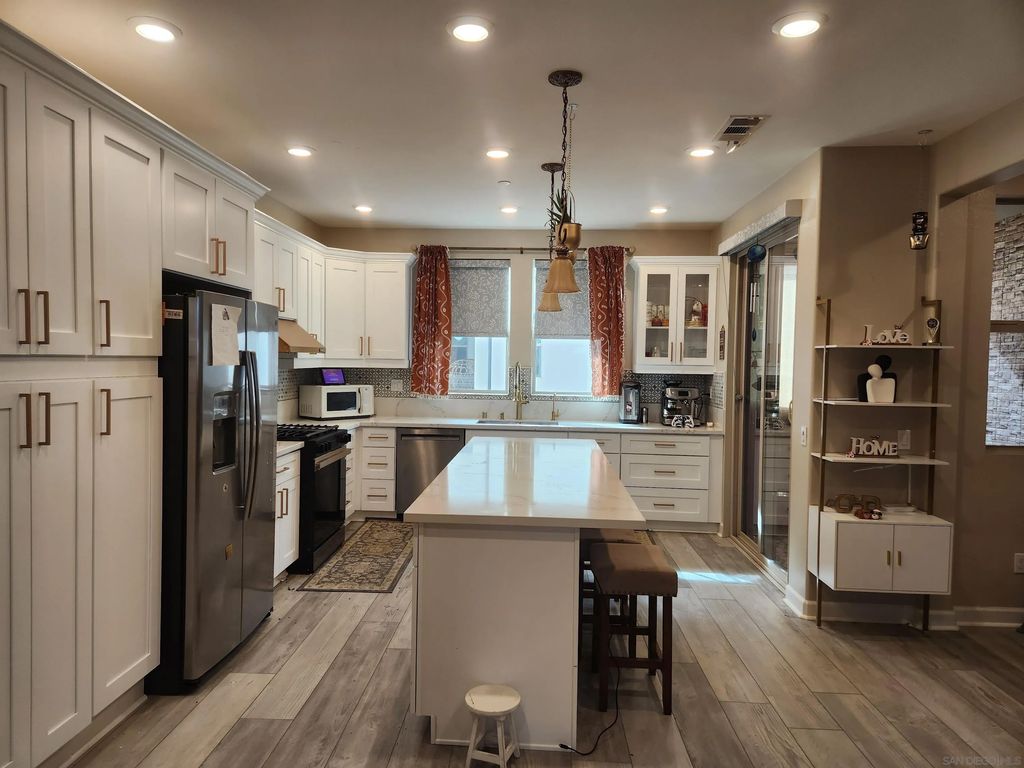 Photo of 16755 Coyote Bush Dr #93, San Diego, CA 92127 (MLS # 260001517)