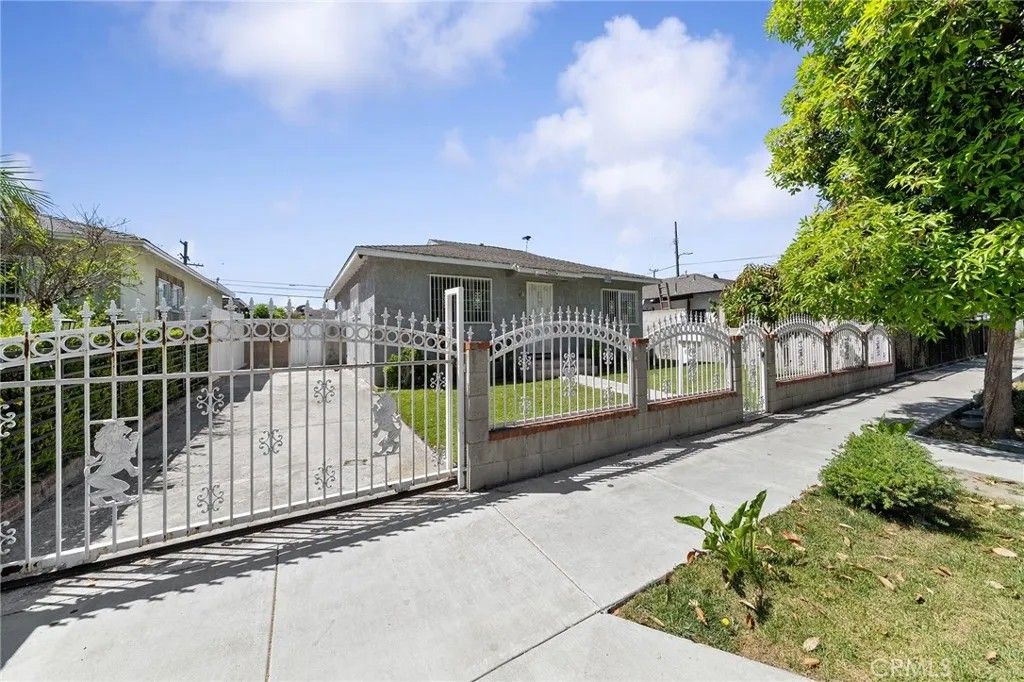 Photo of 1222 E 103rd St, Los Angeles, CA 90002 (MLS # RS26093869)