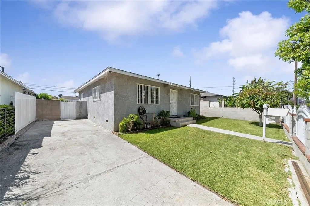 Photo of 1222 E 103rd St, Los Angeles, CA 90002 (MLS # RS26093869)