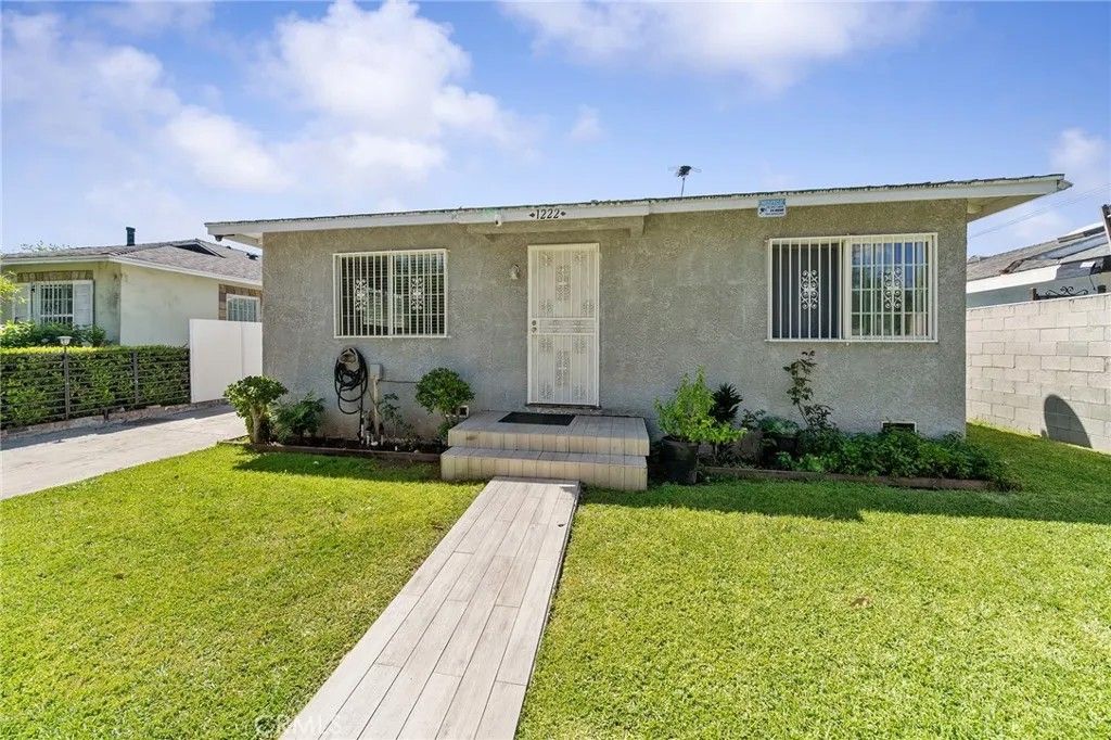 Photo of 1222 E 103rd St, Los Angeles, CA 90002 (MLS # RS26093869)