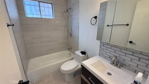 Photo of 823 E 75th St, Los Angeles, CA 90001 (MLS # IN25275263)