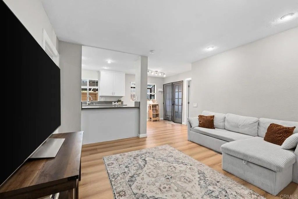 Photo of 3140 Midway Drive #A107, San Diego, CA 92110 (MLS # PTP2601189)