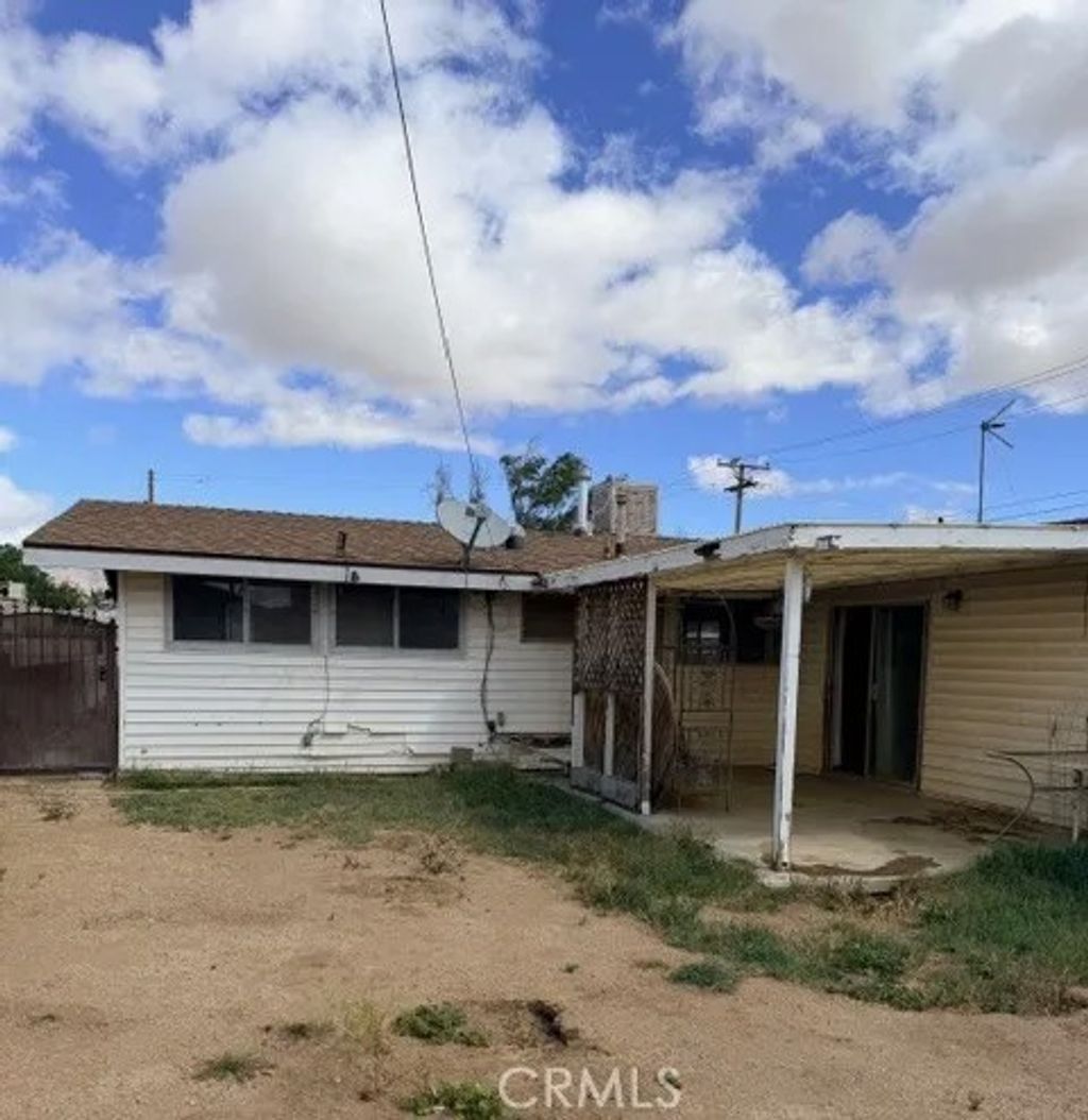 Photo of 2038 Trinity Ave, Mojave, CA 93501 (MLS # DW26091083)