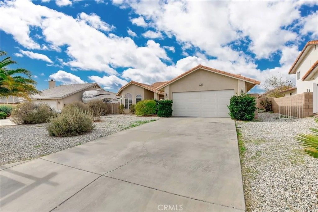 Photo of 12794 Rain Shadow Rd, Victorville, CA 92395 (MLS # PW25278298)