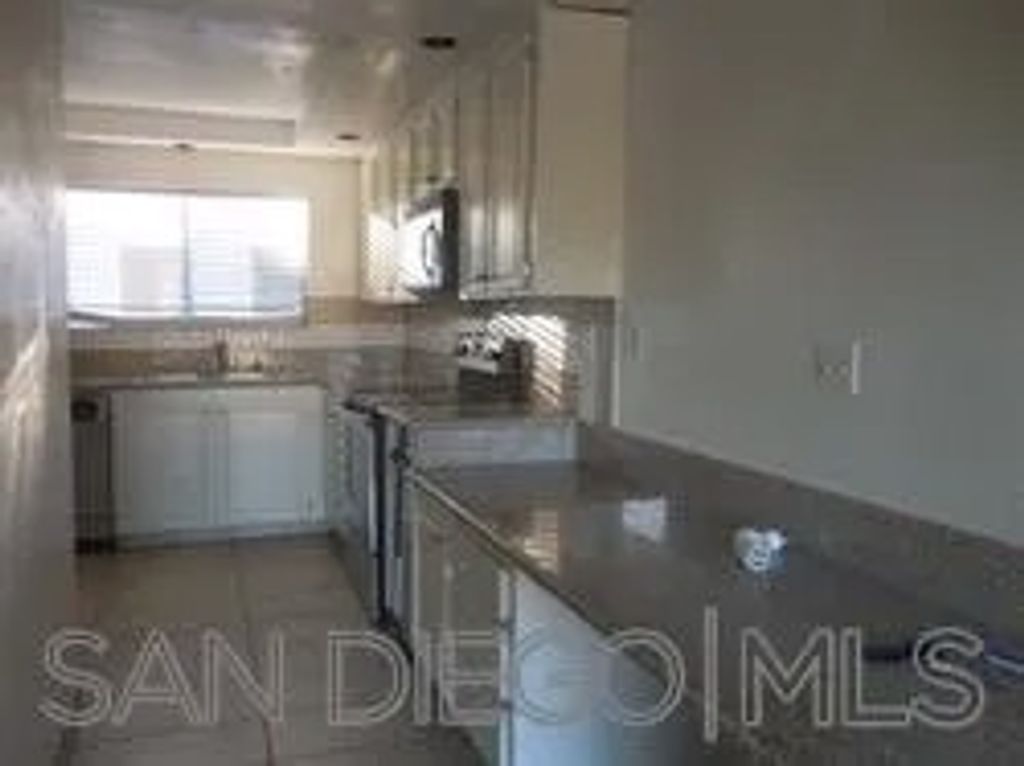 Photo of 1937 Alga Rd #C, Carlsbad, CA 92009 (MLS # 2600808)