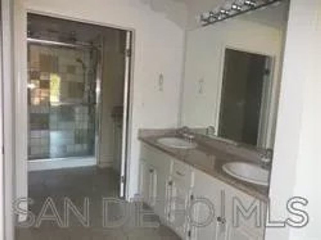 Photo of 1937 Alga Rd #C, Carlsbad, CA 92009 (MLS # 2600808)