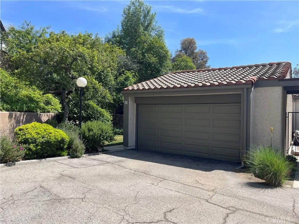 Photo of 11427 Tampa Avenue #76, Porter Ranch, CA 91326 (MLS # SR25280696)